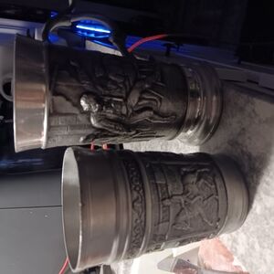 Vintage Silver Tankards with Intricate Designs